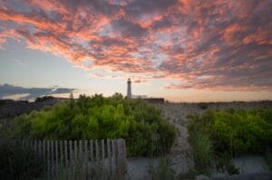 autumn in cape may nj: cape may lighthouse at sunset