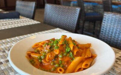 Sautéed with prosciutto & peas, this penne a la vodka is the perfect bite to kickoff your night!