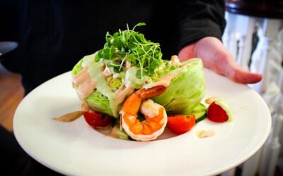 Cool, crisp, and coastal: Our Iceberg Salad with Poached Gulf Shrimp, Crab, and a duo of Louis and Green Goddess dressing is the…